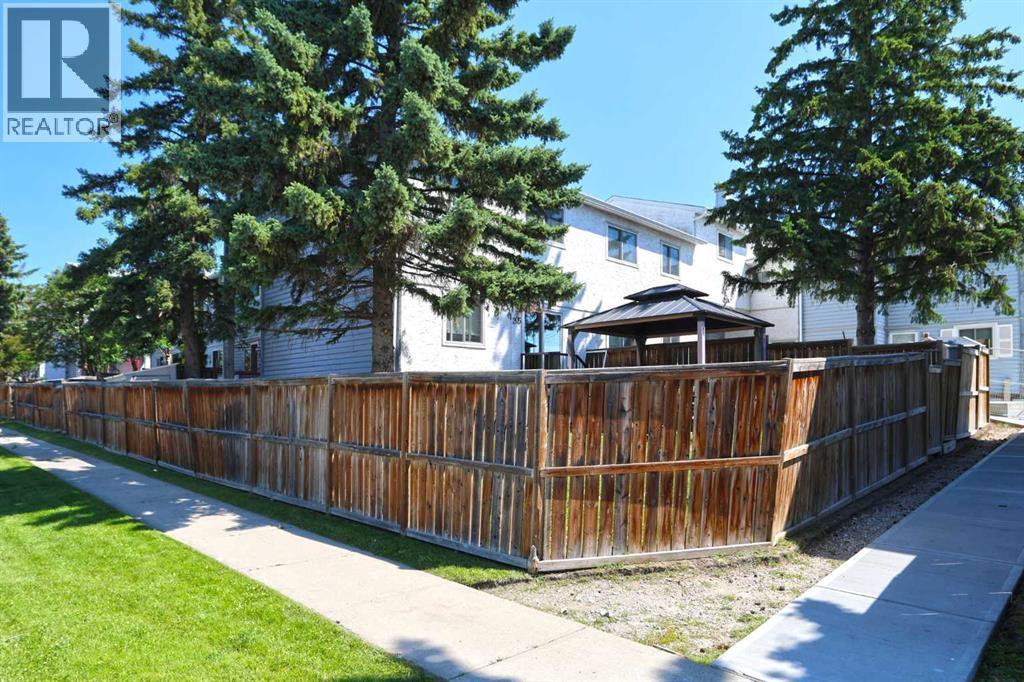 #205 310 Falconridge Crescent NE - 1