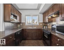 Laundry room - #101 4415 48 St, Leduc, AB T9E5Y3 Photo 6