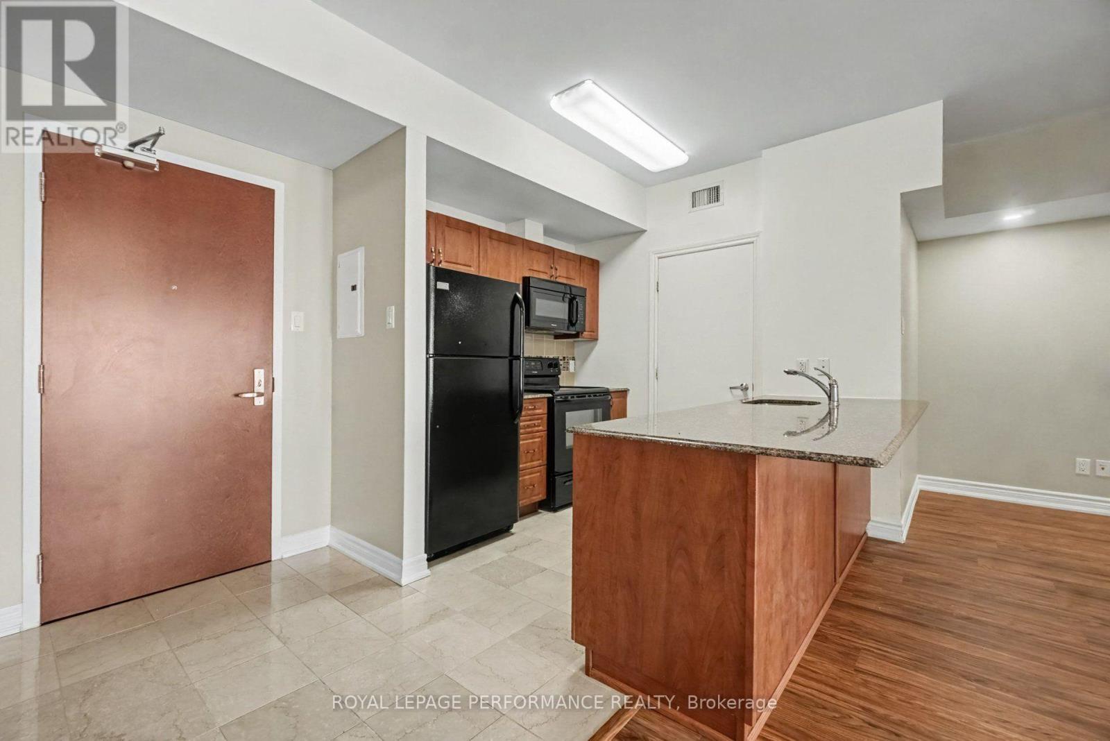 granite counter with breakfast bar