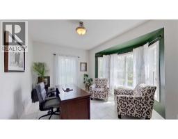 Family room - 24, 33049 Range Road 12, Rural Mountain View County, AB T4H4N3 Photo 13