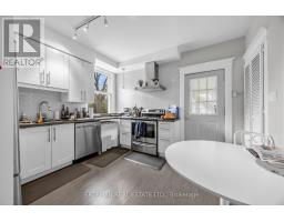 Living room - 129 Indian Road, Toronto, ON M6R2V5 Photo 12