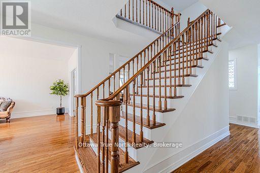 Elegant staircase as focal point welcome!
