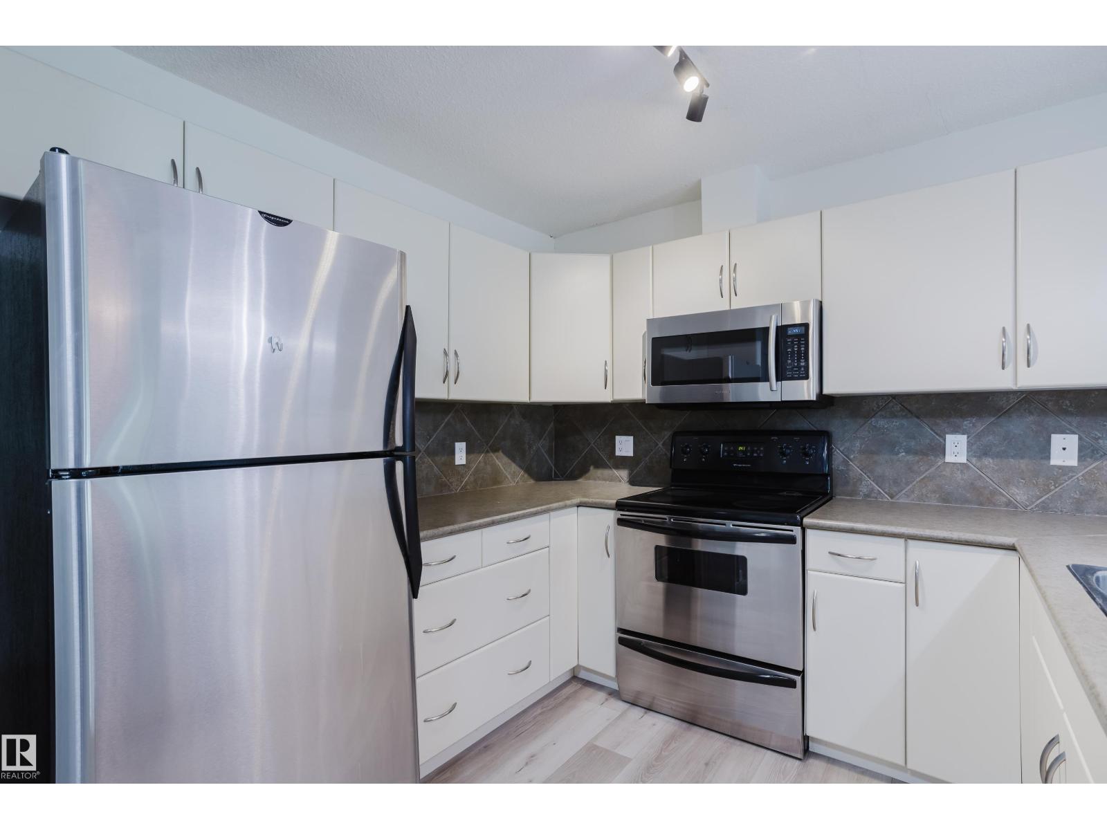 108 278 Suder Greens Drive NW - Photo 8