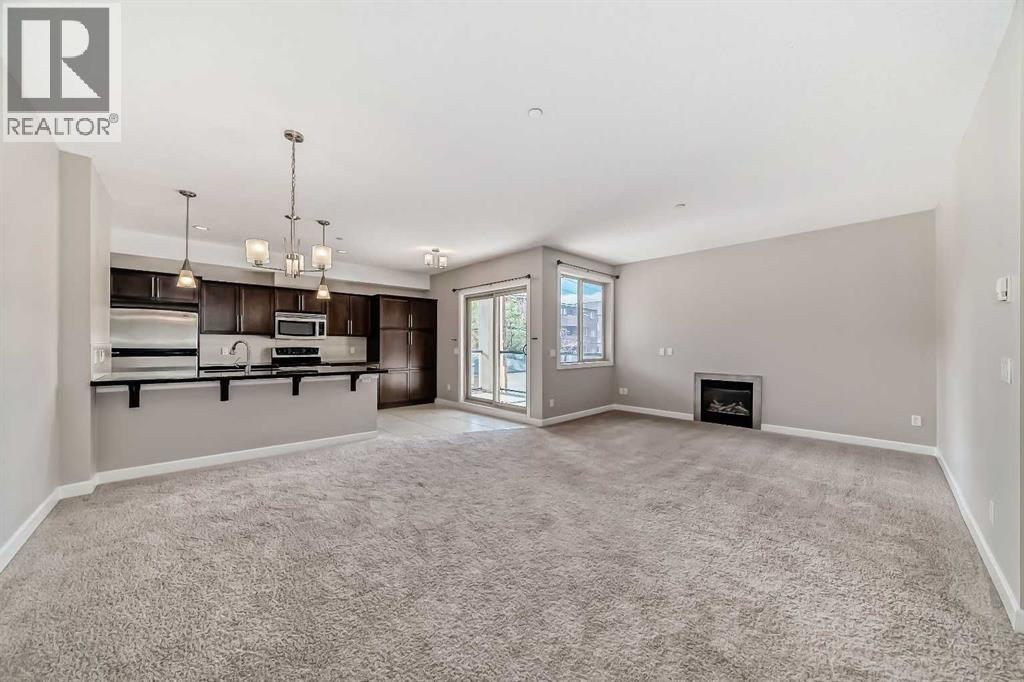 #206 488 7 Avenue NE - 11