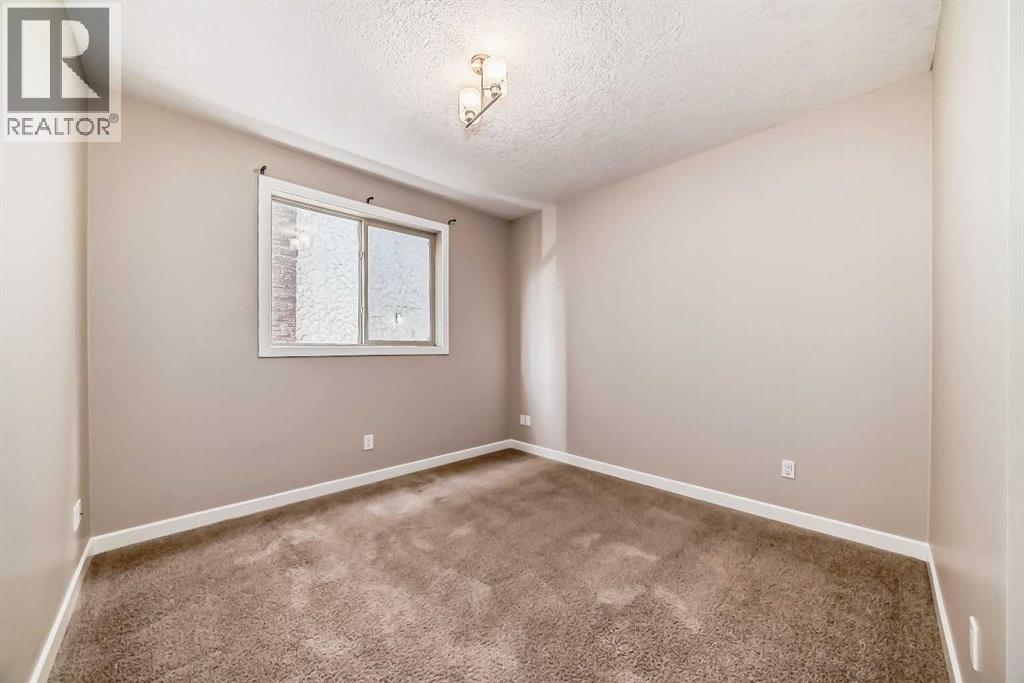 #206 488 7 Avenue NE - 14