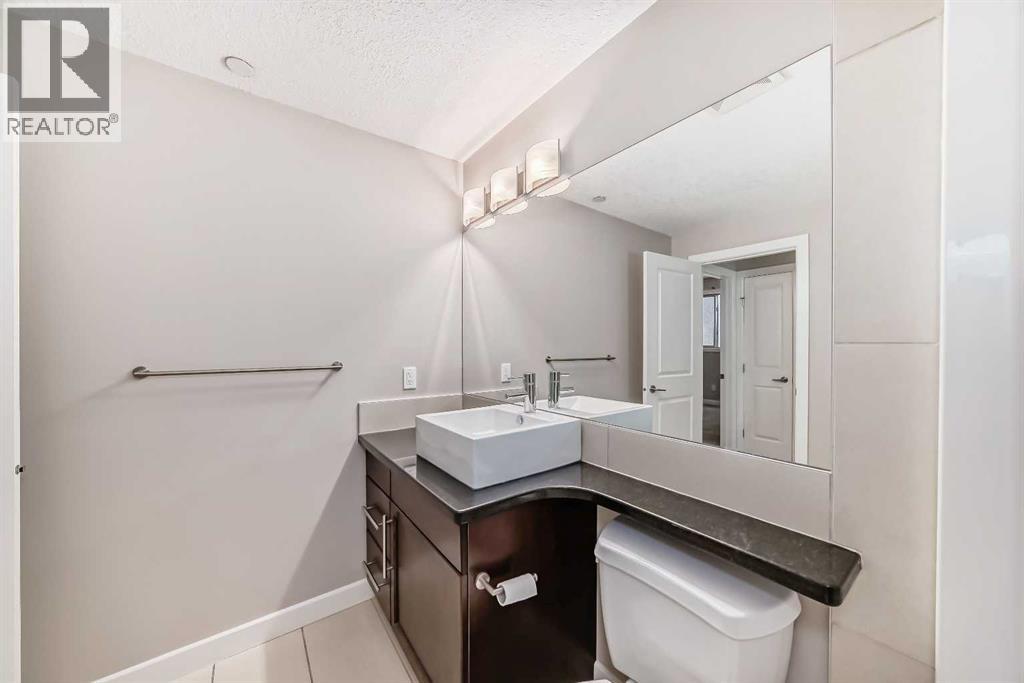 #206 488 7 Avenue NE - 21