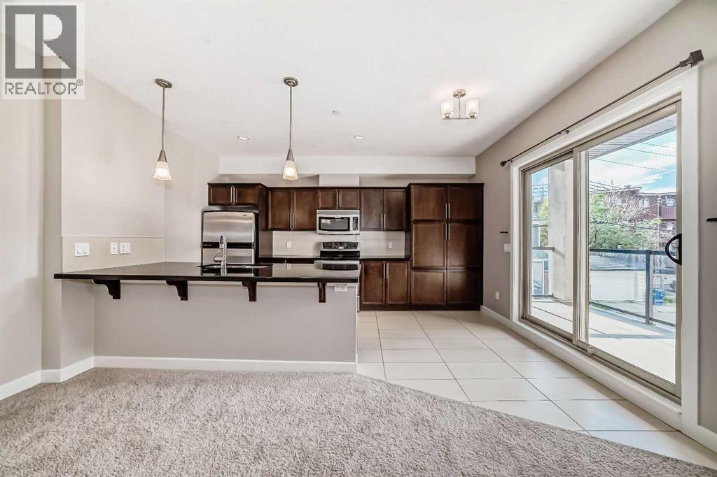 #206 488 7 Avenue NE - 3