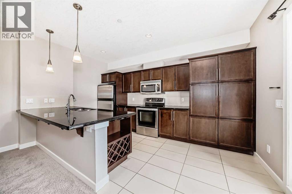 #206 488 7 Avenue NE - 4