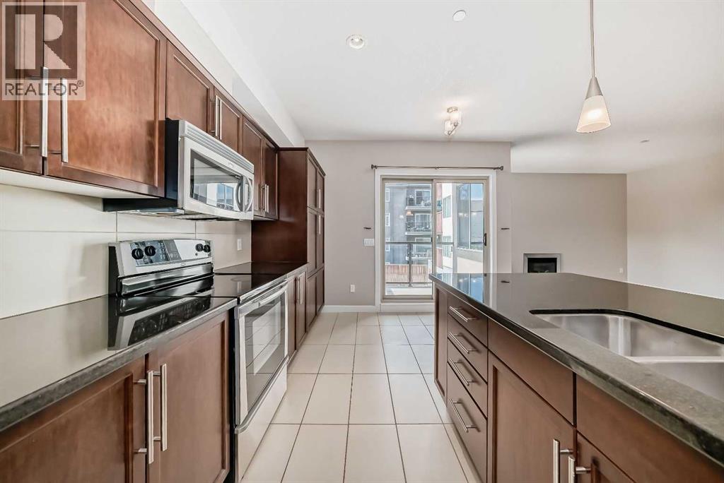 #206 488 7 Avenue NE - 7