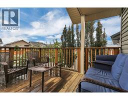 Family room - 203 Cedar Square, Blackfalds, AB T4M0A4 Photo 11
