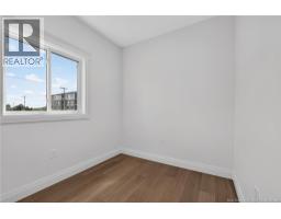 Living room - 66 Bouchard Street, Dieppe, NB E1A9T9 Photo 17
