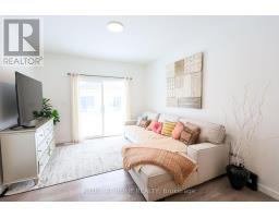 Bedroom 2 - 32 - 100 Highriver Trail, Welland, ON L3C0H6 Photo 6