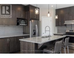Family room - 305 Oxer Place, Ottawa, ON K2V0C6 Photo 12