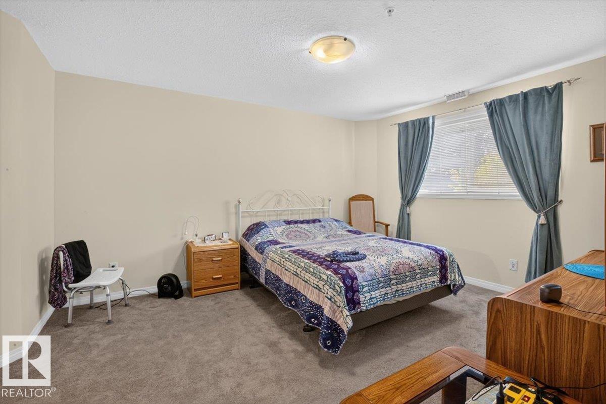116 237 YOUVILLE DR E NW - Photo 19