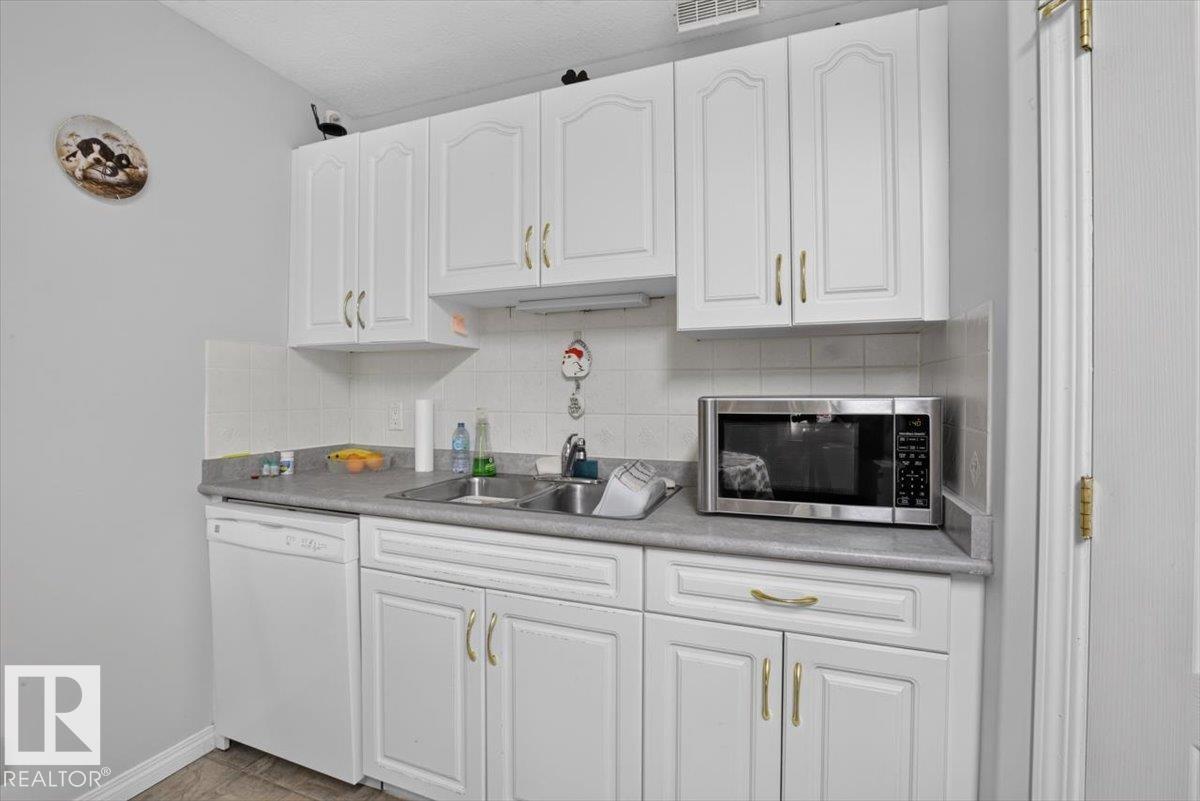 116 237 YOUVILLE DR E NW - Photo 9
