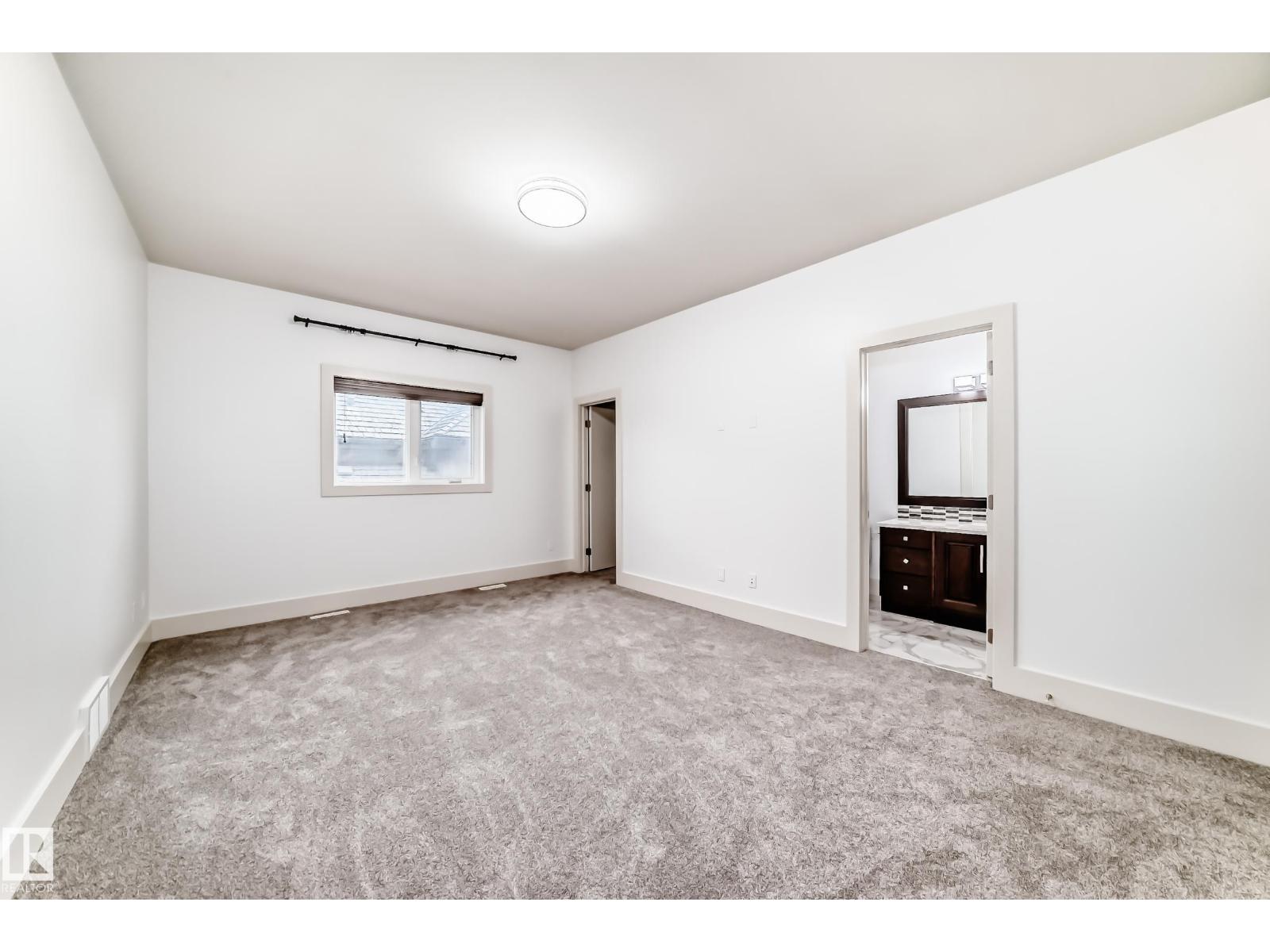 5511 MCLUHAN BLUFF BL NW - Photo 38