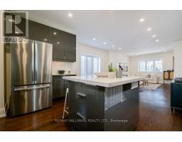 Laundry room - 338 Kenilworth Avenue, Toronto, ON M4L3S8 Photo 8
