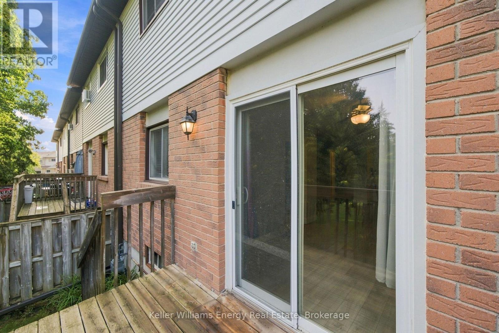 #105 700 HARMONY ROAD N - 27