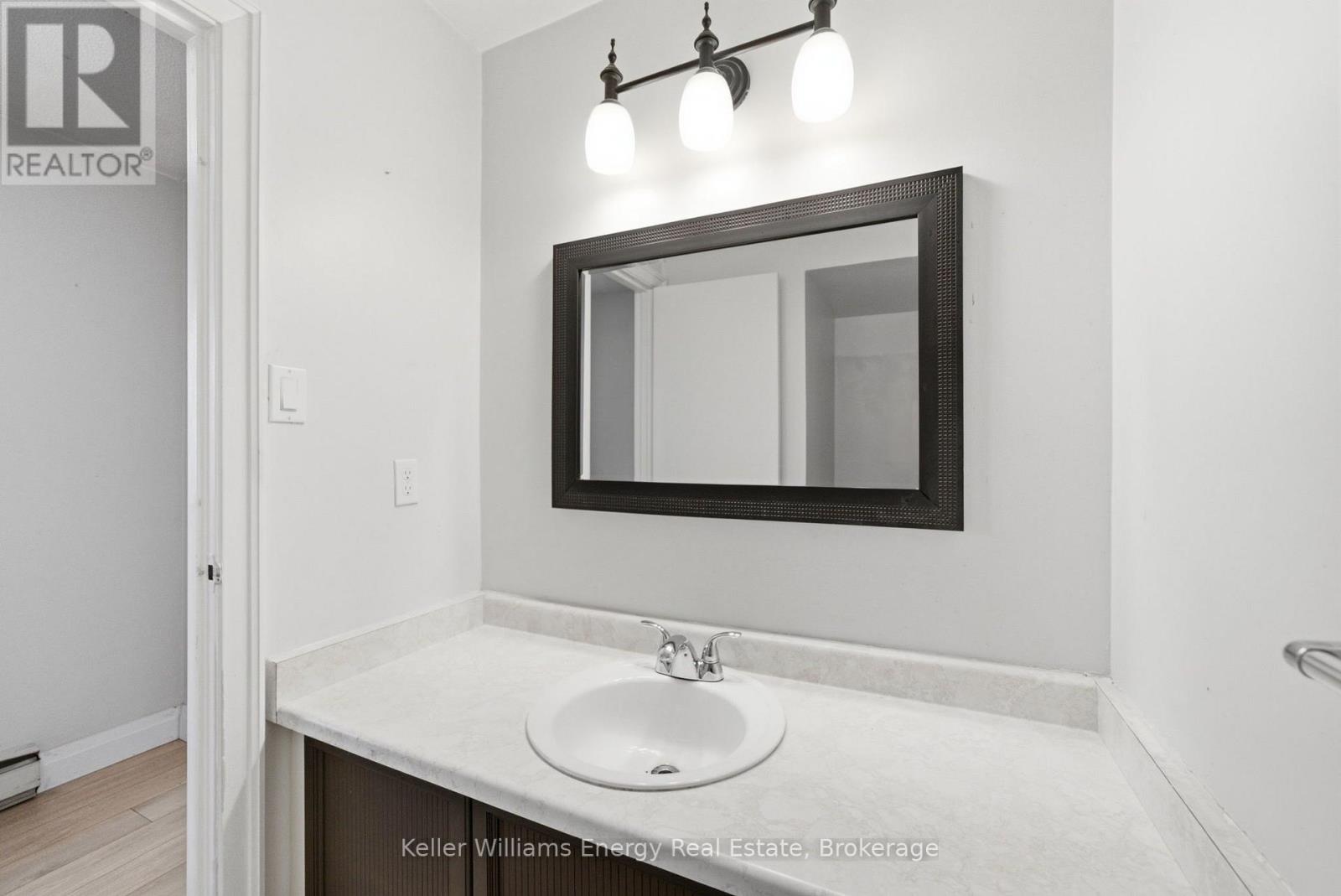 #105 700 HARMONY ROAD N - Image 15