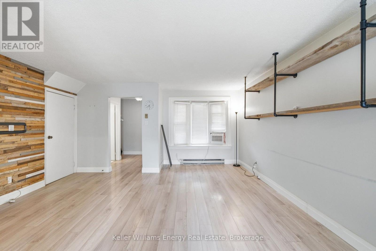 #105 700 HARMONY ROAD N - Image 13