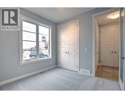 Bedroom - 2085 Cobblespring Avenue Sw, Airdrie, AB T4B5Z6 Photo 10