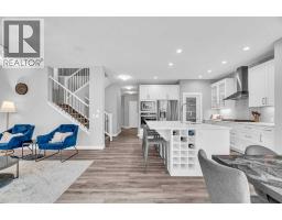 Primary Bedroom - 49 Creekside Avenue Sw, Calgary, AB T2X4A9 Photo 9