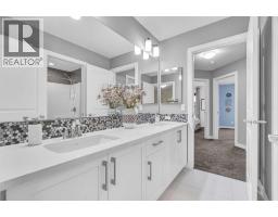 49 Creekside Avenue Sw, Calgary, AB T2X4A9 Photo 32