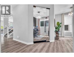 Laundry room - 49 Creekside Avenue Sw, Calgary, AB T2X4A9 Photo 16