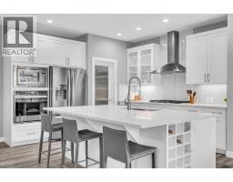 Family room - 49 Creekside Avenue Sw, Calgary, AB T2X4A9 Photo 8