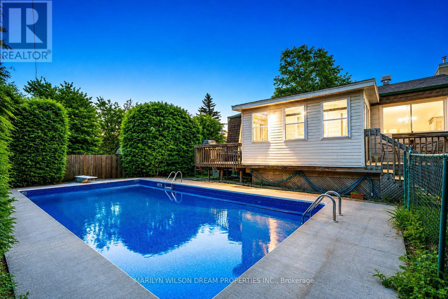 3 Season room overlooking private yard and pool!