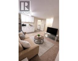 Family room - 83 Luxstone Crescent Sw, Airdrie, AB T4B2W7 Photo 14