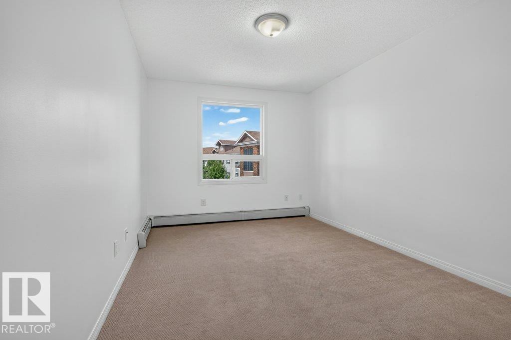 #2309 7343 SOUTH TERWILLEGAR DR NW - 13