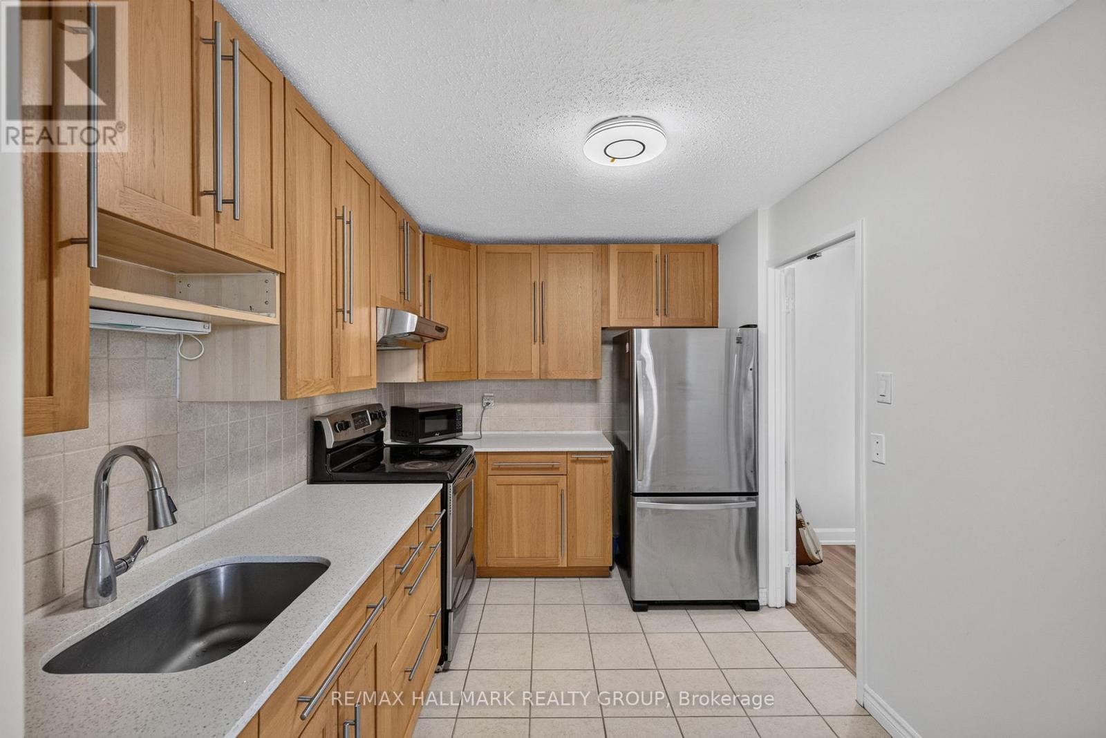 2 Bed, 1 Bath Apartment for Sale in Ottawa – 313 – 1505 BASELINE ROAD, Ottawa – MLS# X13675286 - Image 18
