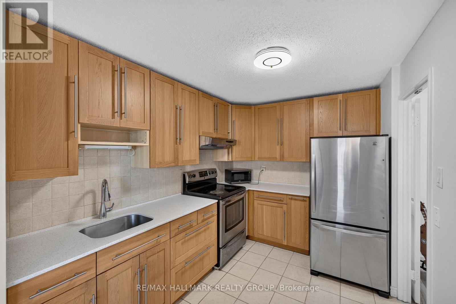 2 Bed, 1 Bath Apartment for Sale in Ottawa – 313 – 1505 BASELINE ROAD, Ottawa – MLS# X13675286 - Image 19
