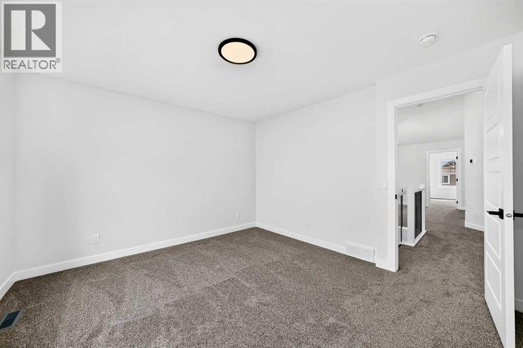 583 Buffaloberry Manor Southeast - Photo 11