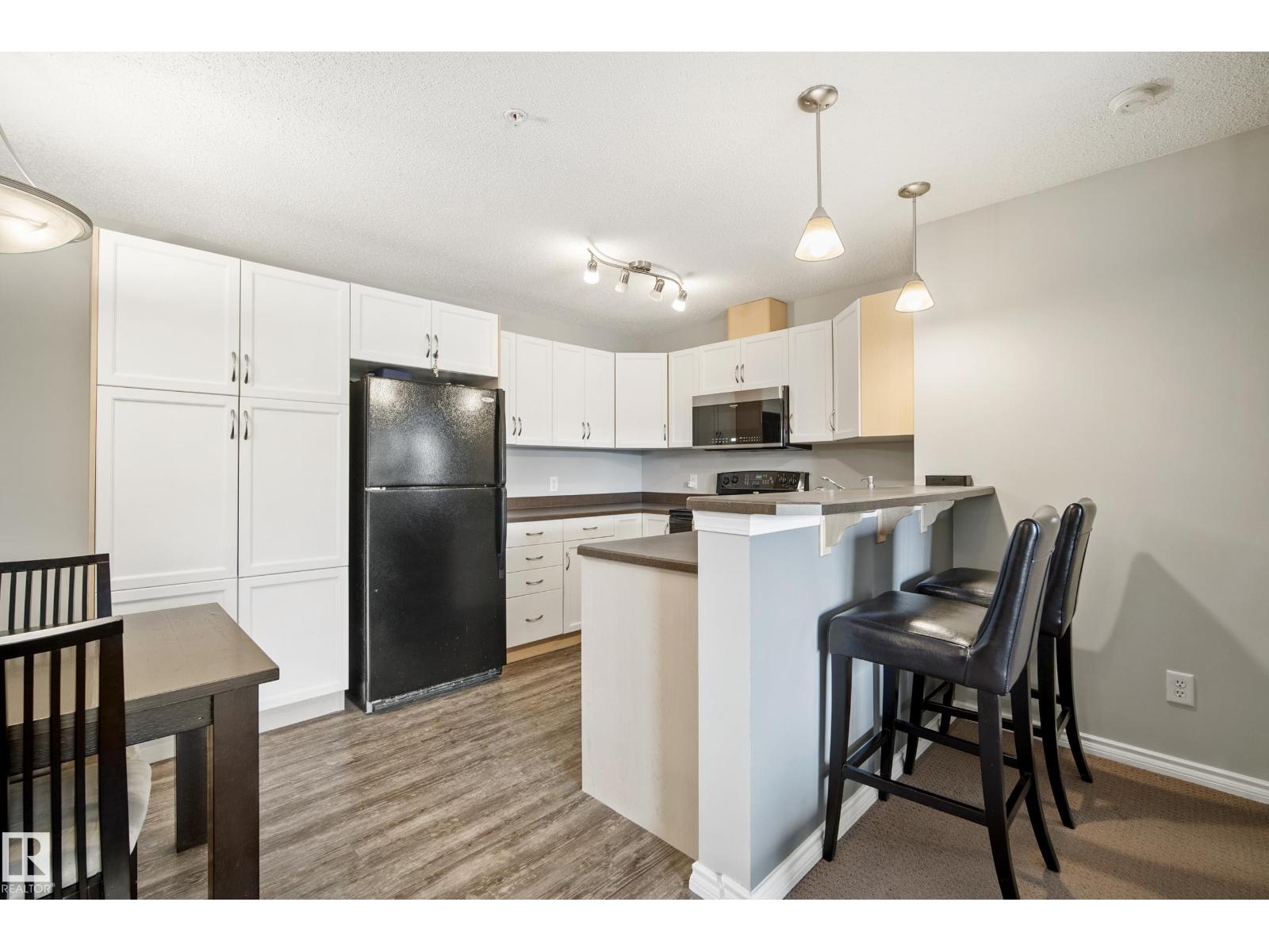 340 2436 GUARDIAN Road NW - Photo 5