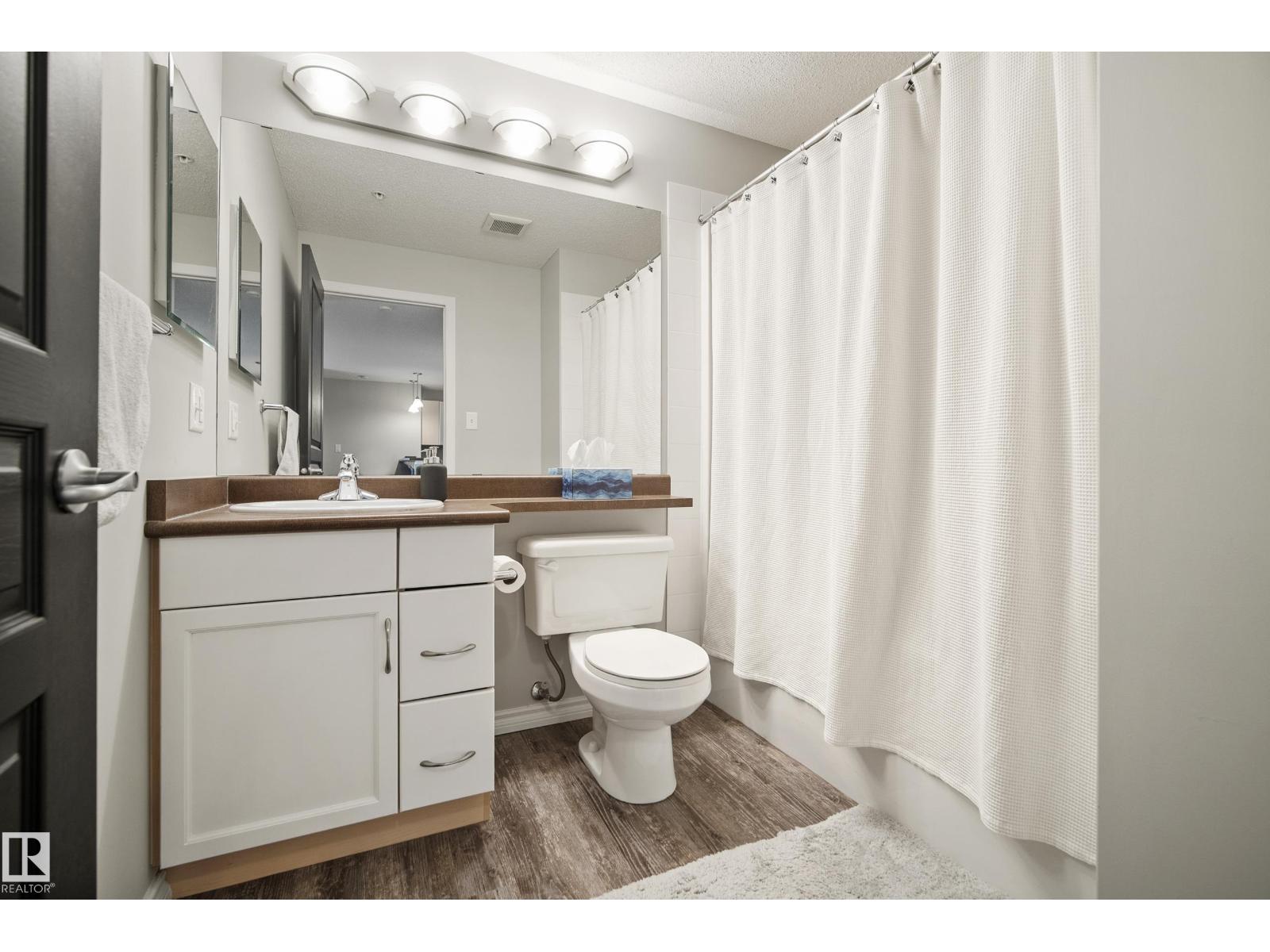 340 2436 GUARDIAN Road NW - Photo 8