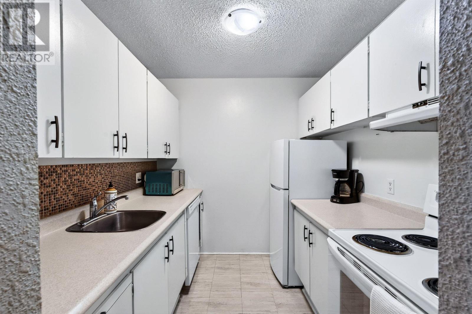 #303 5572 North Ridge Road - 26