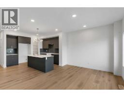 2pc Bathroom - 15 Heritage Heath, Cochrane, AB T4C3K8 Photo 9