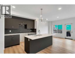 Bonus Room - 15 Heritage Heath, Cochrane, AB T4C3K8 Photo 6