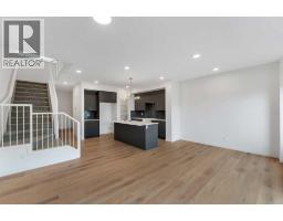 Living room - 15 Heritage Heath, Cochrane, AB T4C3K8 Photo 7