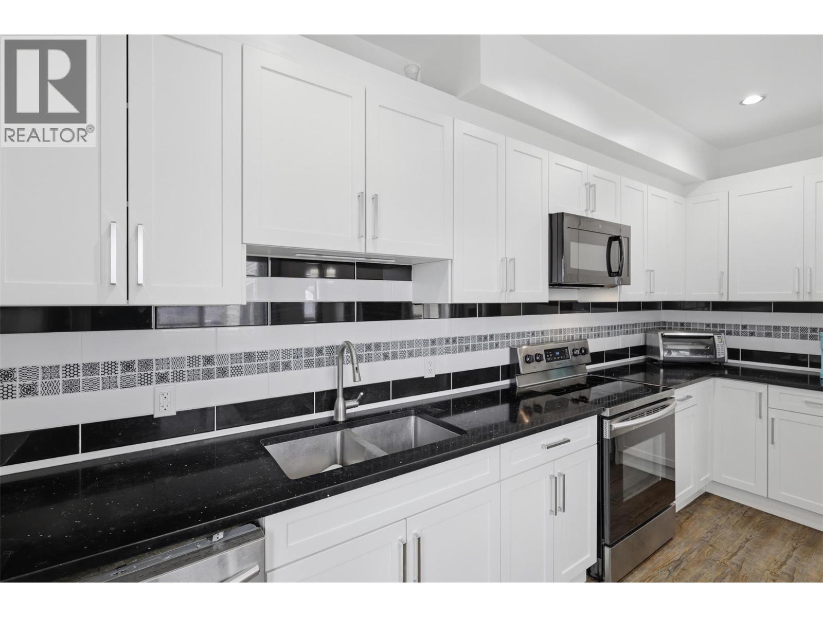 #102 438 WADDINGTON Drive - 6