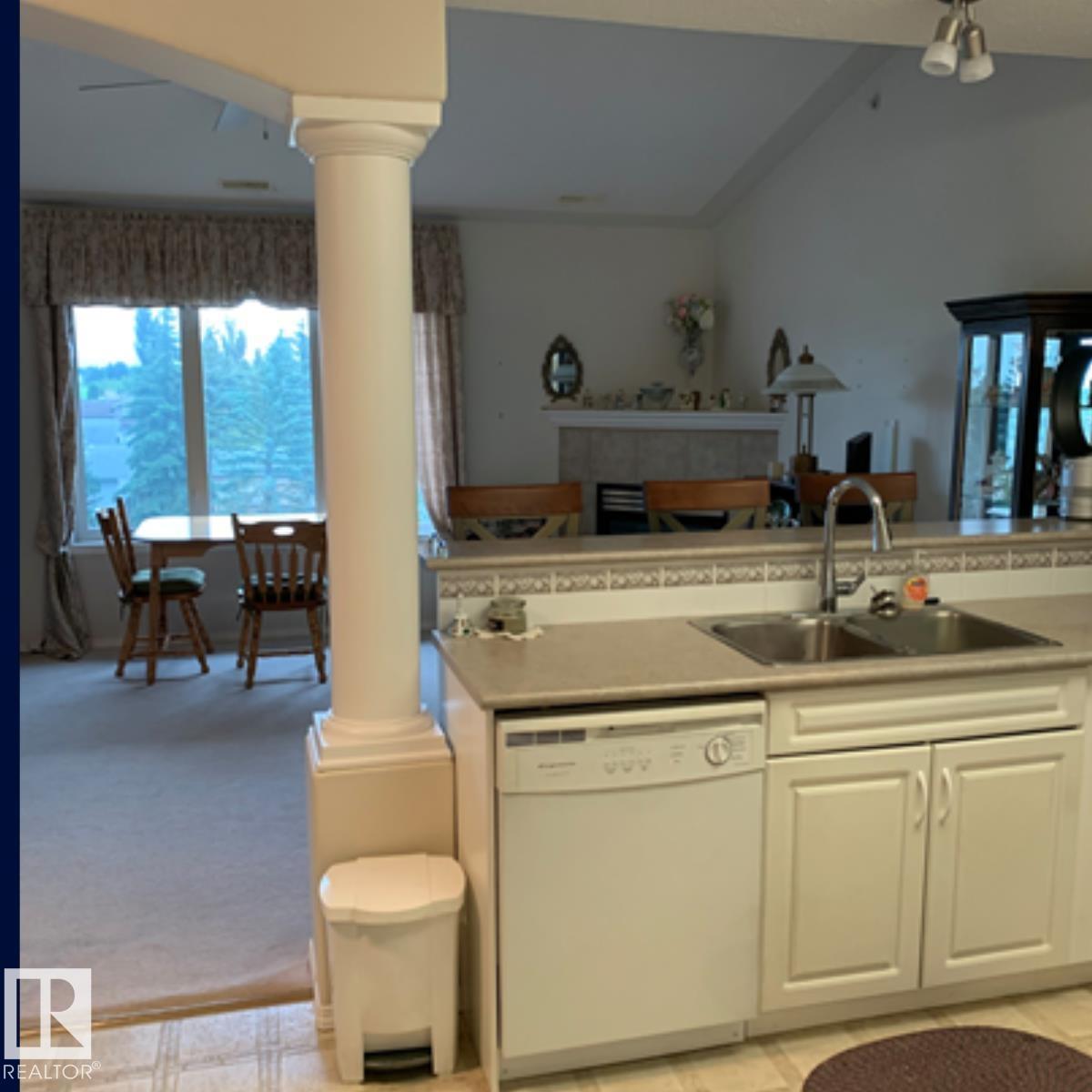 511 261 YOUVILLE DR E NW - Photo 13