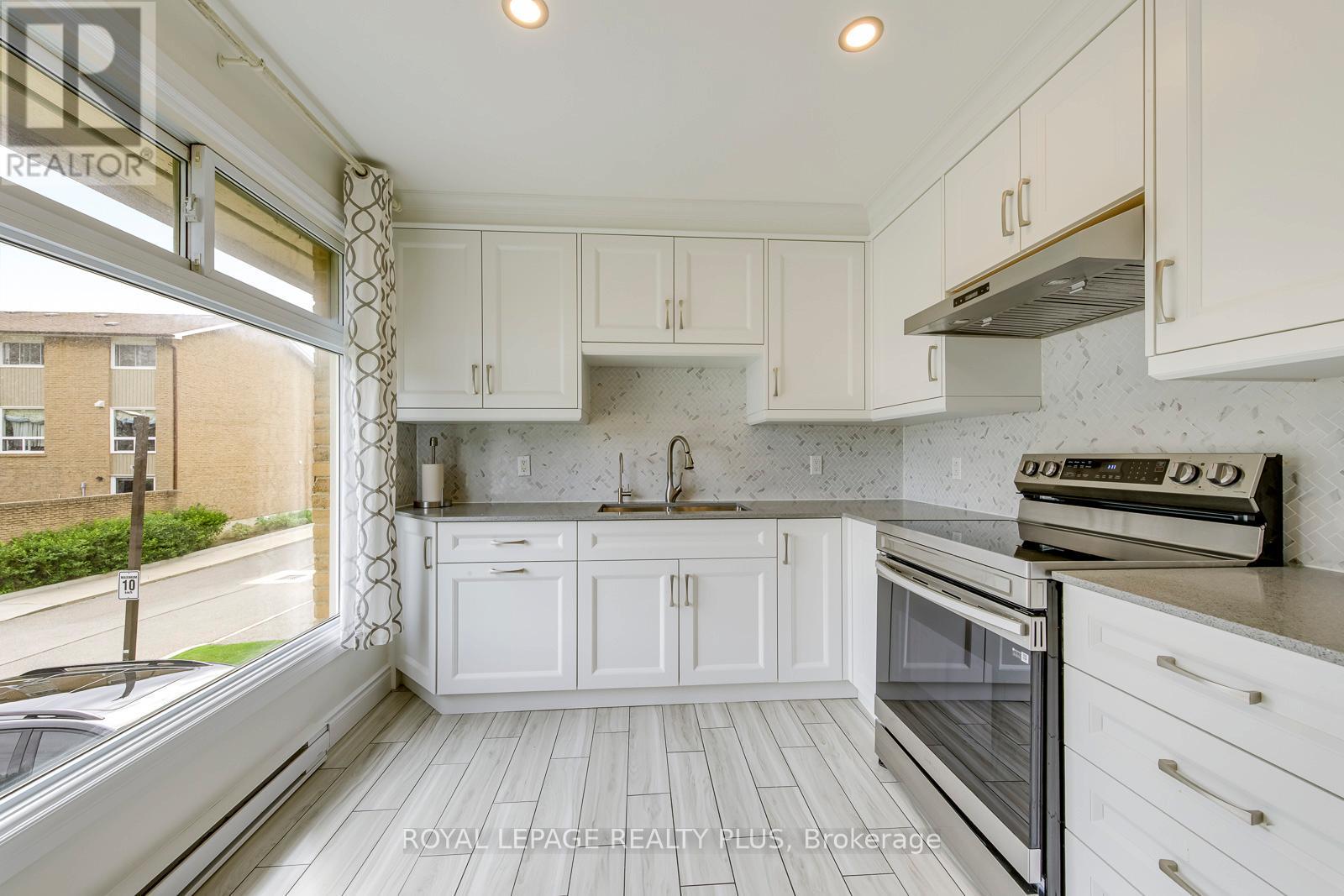 #1 640 RATHBURN ROAD E - 13