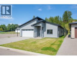Primary bedroom of 116 960 NORTH NECHAKO ROAD · Prince George, BC