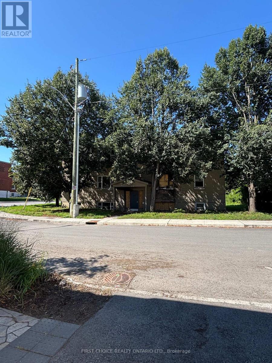 Front - Width of the lot with the existing 6 unit