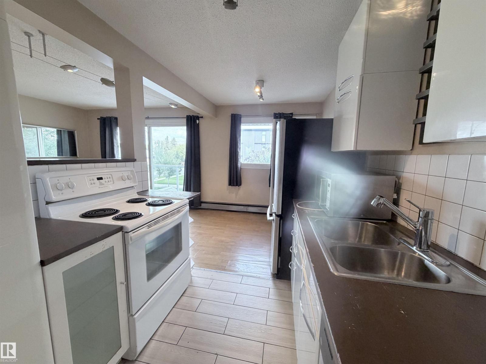 #306 11340 124 ST NW - 13