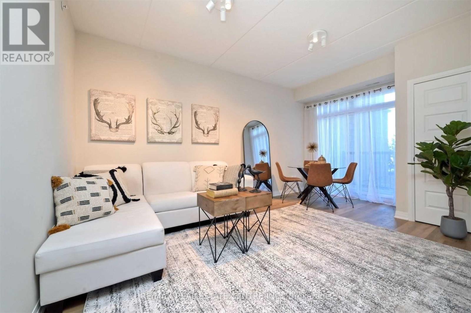 #102 610 FARMSTEAD DRIVE - 2