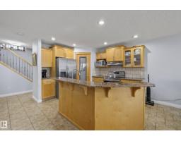 Recreation room - 16604 59 St Nw, Edmonton, AB T5Y0J2 Photo 9