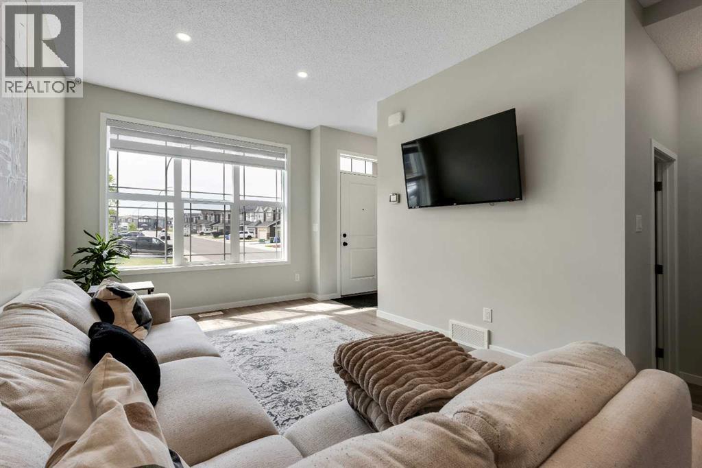 46 Creekstone Path SW, Pine Creek, Calgary photo 5